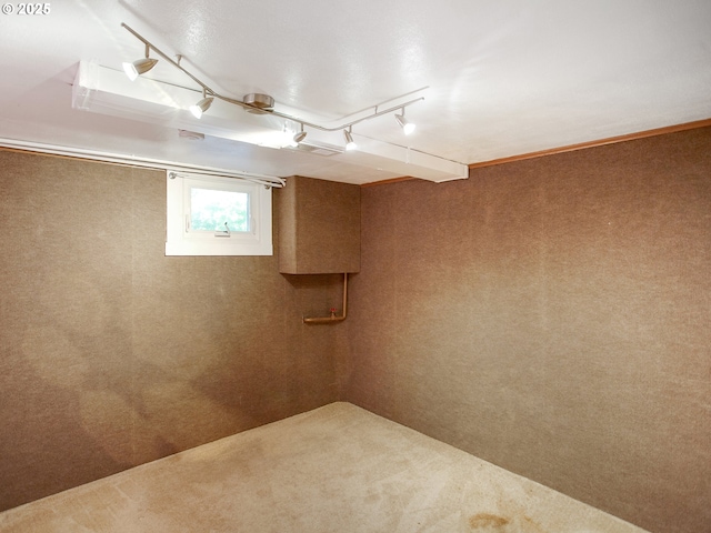 4214 NE Hassalo St, Portland, OR 97213 - basement with carpet flooring and track lighting