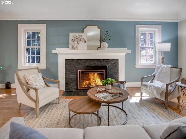 4214 NE Hassalo St, Portland, OR 97213 - living room featuring a fireplace and wood finished floors