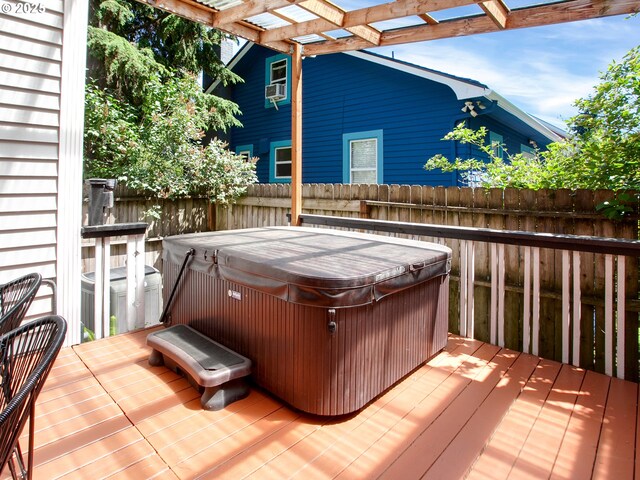 4214 NE Hassalo St, Portland, OR 97213 - wooden terrace with a hot tub and a pergola