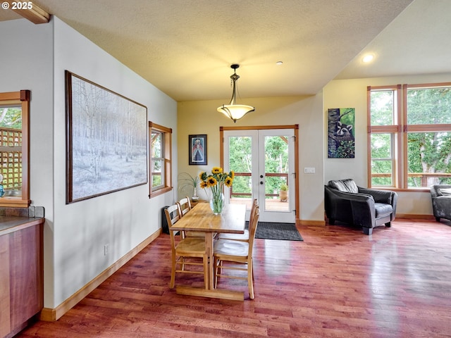 111 5th St, Silverton, OR 97381 - dining space featuring french doors, wood finished floors, plenty of natural light, baseboards, and recessed lighting