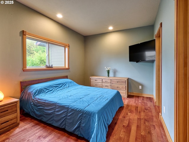 111 5th St, Silverton, OR 97381 - bedroom with wood finished floors, recessed lighting, and baseboards