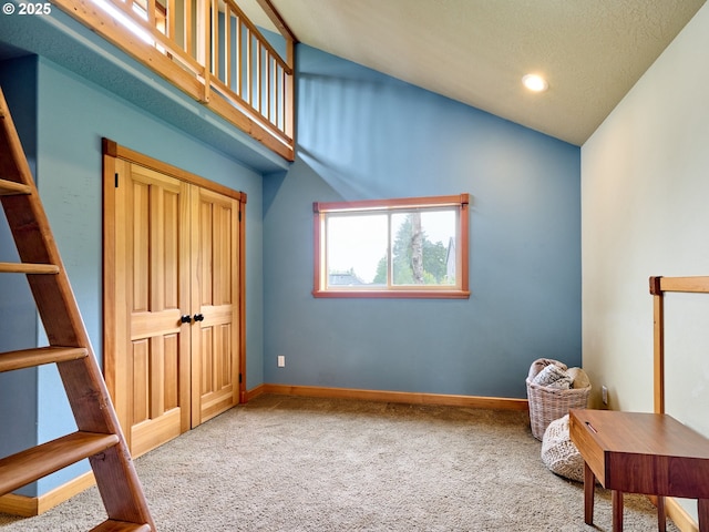111 5th St, Silverton, OR 97381 - bedroom with carpet flooring, baseboards, high vaulted ceiling, and recessed lighting