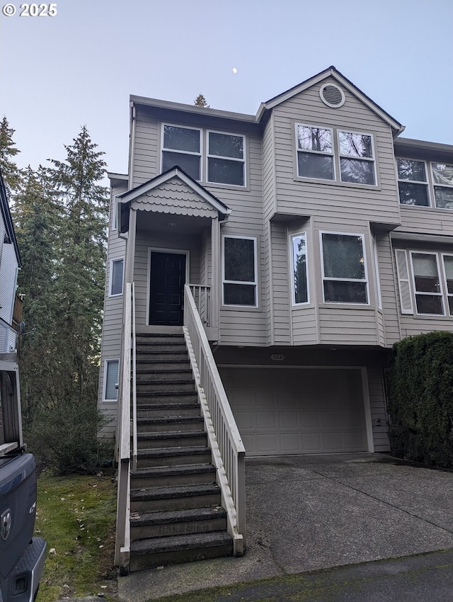 view of front of property with a garage