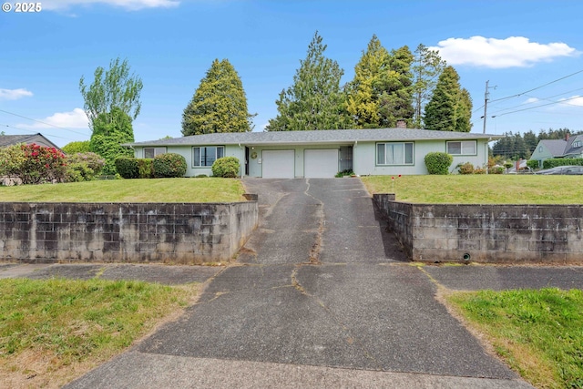 110 N Dean St, Coquille, OR 97423 - ranch-style house featuring driveway, a garage, a front lawn, and stucco siding