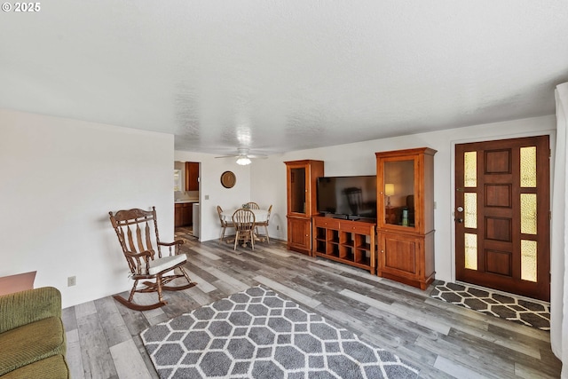 110 N Dean St, Coquille, OR 97423 - living room featuring wood finished floors and a ceiling fan