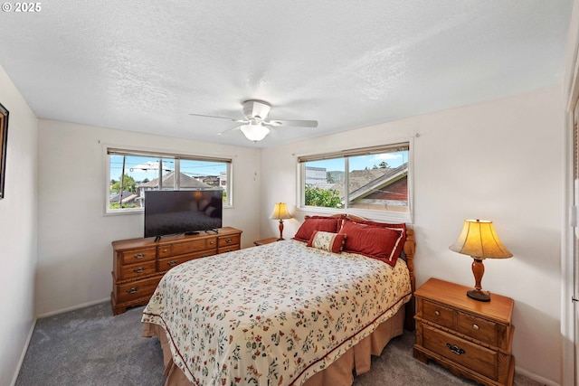 110 N Dean St, Coquille, OR 97423 - bedroom with carpet, ceiling fan, baseboards, and a textured ceiling