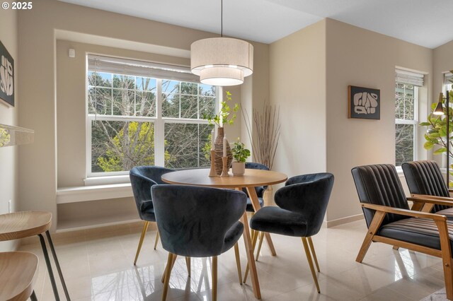 30326 SW Ruth St Unit 58, Wilsonville, OR 97070 - dining room with baseboards and a healthy amount of sunlight