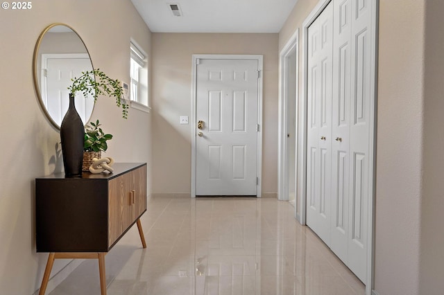 30326 SW Ruth St Unit 58, Wilsonville, OR 97070 - doorway with visible vents, baseboards, and light tile patterned flooring