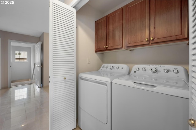 30326 SW Ruth St Unit 58, Wilsonville, OR 97070 - washroom with cabinet space and washing machine and clothes dryer