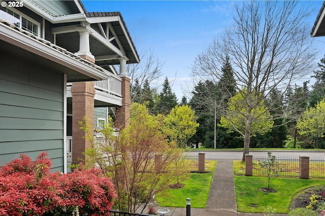 30326 SW Ruth St Unit 58, Wilsonville, OR 97070 - view of yard with fence and a balcony