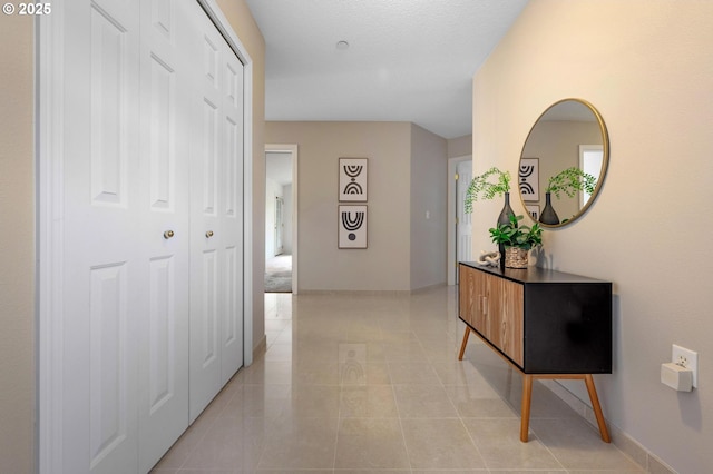 30326 SW Ruth St Unit 58, Wilsonville, OR 97070 - hallway featuring light tile patterned flooring