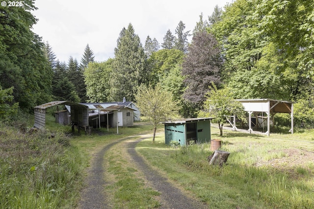 18570 Oakdale Rd, Dallas, OR 97338 - view of dirt / gravel road with a wooded view