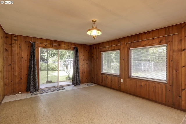 18570 Oakdale Rd, Dallas, OR 97338 - empty room featuring wood walls and healthy amount of natural light