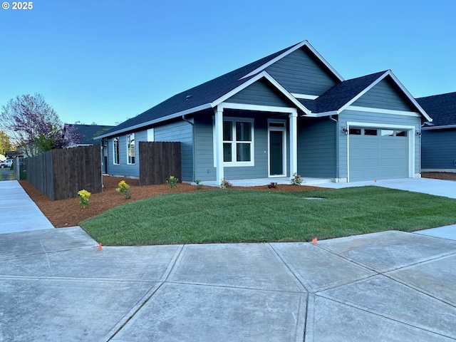650 Rainbow Way, Kelso, WA 98626 - ranch-style home with a garage, concrete driveway, and a shingled roof