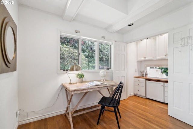 4401 SW Westdale Dr, Portland, OR 97221 - office space featuring light wood-style floors, baseboards, and beamed ceiling