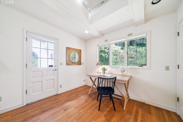 4401 SW Westdale Dr, Portland, OR 97221 - dining space featuring wood finished floors, baseboards, a healthy amount of sunlight, and beam ceiling