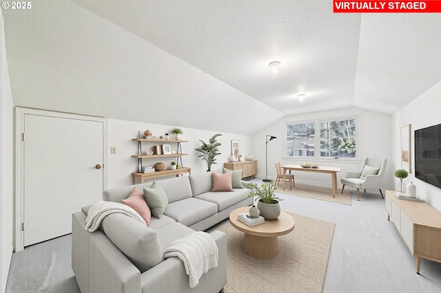 4401 SW Westdale Dr, Portland, OR 97221 - carpeted living room with a textured ceiling and vaulted ceiling