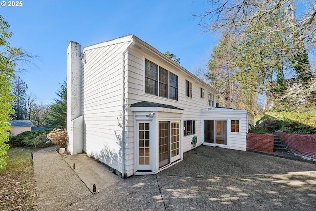 4401 SW Westdale Dr, Portland, OR 97221 - back of property featuring a chimney