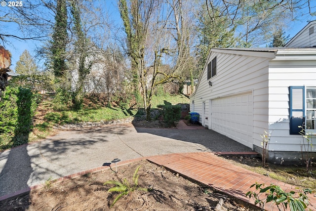 4401 SW Westdale Dr, Portland, OR 97221 - view of yard featuring driveway and a garage