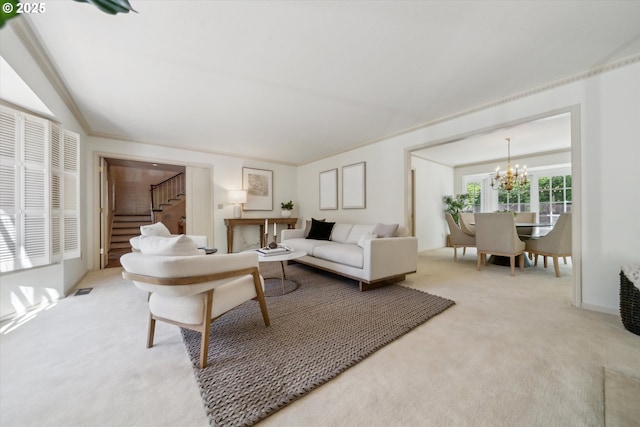 4401 SW Westdale Dr, Portland, OR 97221 - carpeted living room with an inviting chandelier and stairs