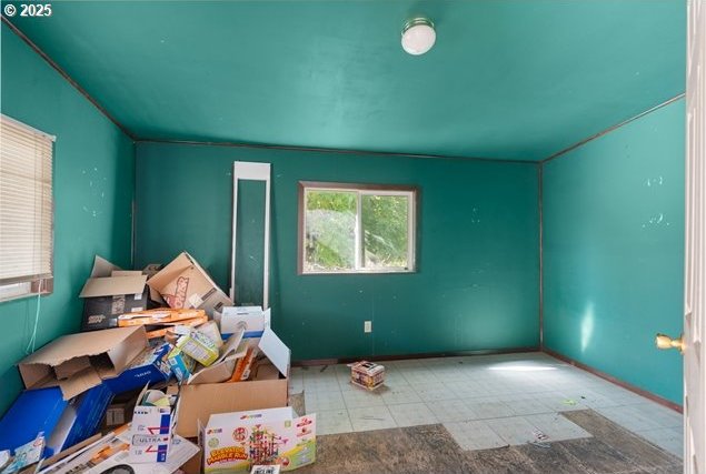 unfurnished bedroom with tile patterned floors