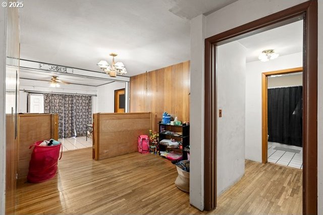 interior space featuring an inviting chandelier and wood finished floors