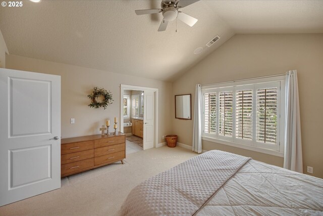 bedroom with multiple windows, lofted ceiling, visible vents, and light colored carpet
