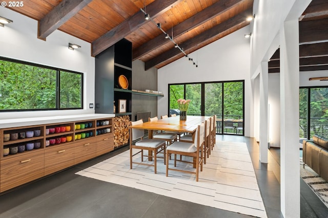 3777 Parkwood Way W, Linn, OR 97068 - dining room featuring wood ceiling with exposed beams and high vaulted ceiling