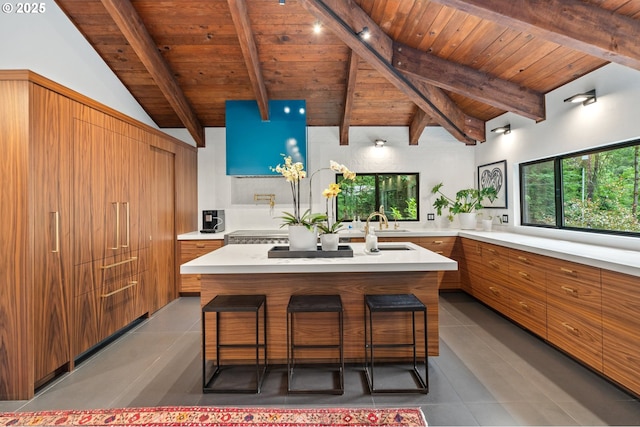 3777 Parkwood Way W, Linn, OR 97068 - kitchen featuring modern cabinets, light countertops, wooden ceiling, and brown cabinetry