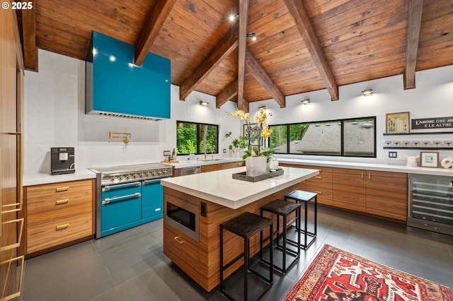 3777 Parkwood Way W, Linn, OR 97068 - kitchen with appliances with stainless steel finishes, beverage cooler, wooden ceiling, light countertops, and a sink