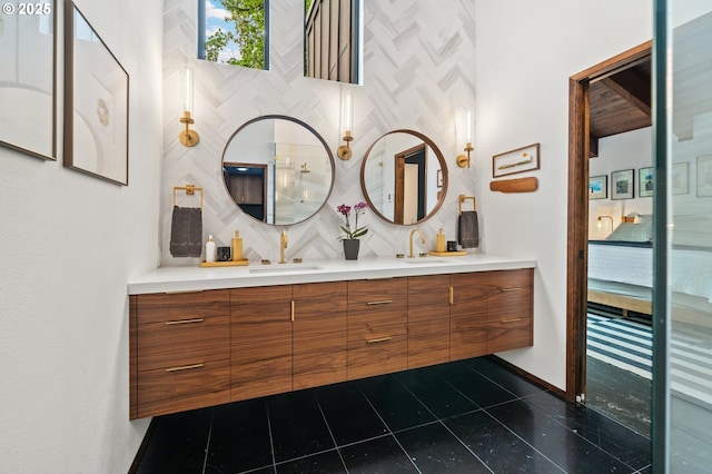 3777 Parkwood Way W, Linn, OR 97068 - ensuite bathroom with double vanity, backsplash, tile patterned floors, and baseboards