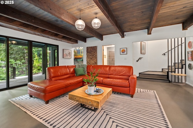 3777 Parkwood Way W, Linn, OR 97068 - living room with finished concrete floors, stairway, wood ceiling with exposed beams, and baseboards