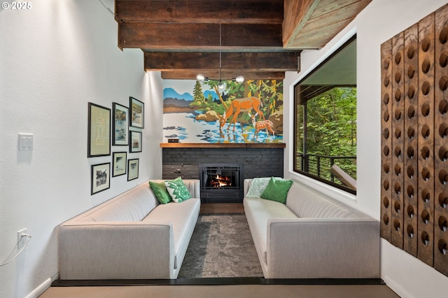 3777 Parkwood Way W, Linn, OR 97068 - living room featuring beamed ceiling and a brick fireplace