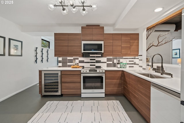 3777 Parkwood Way W, Linn, OR 97068 - kitchen with stainless steel appliances, beverage cooler, a sink, modern cabinets, and brown cabinets