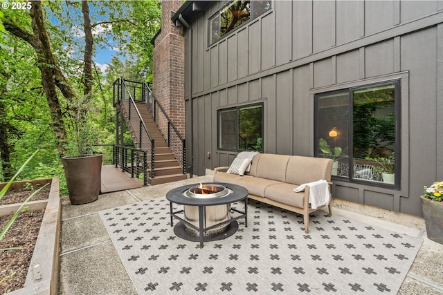 3777 Parkwood Way W, Linn, OR 97068 - view of patio with stairs and an outdoor living space with a fire pit