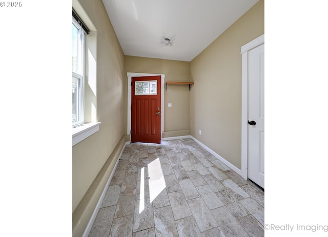 1724 SE 40th Ave, Portland, OR 97214 - foyer with baseboards and light stone finish floors