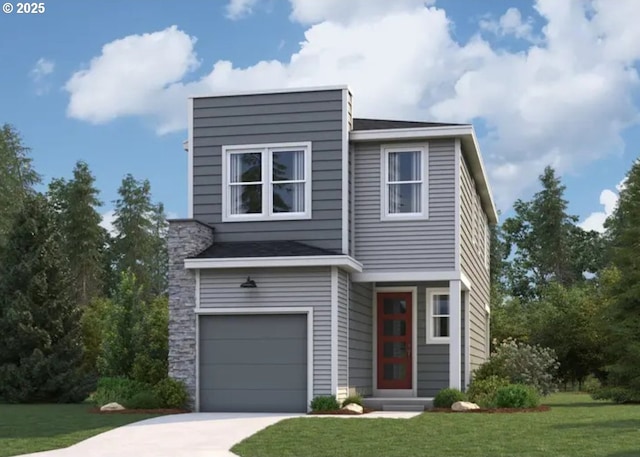 view of front of property with a garage and a front yard