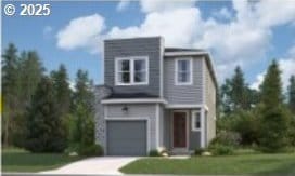 view of front of home featuring a garage and a front yard