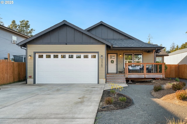 view of front of home with a garage and covered porch