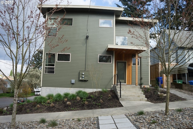 view of front of property with entry steps