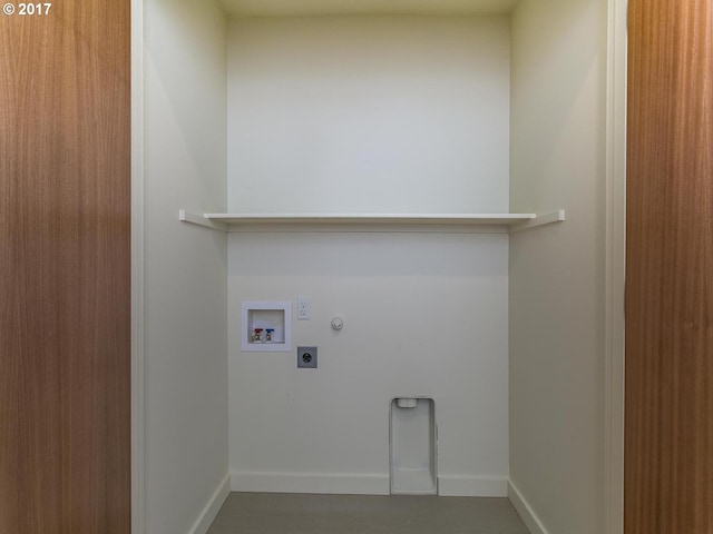 laundry room with washer hookup, gas dryer hookup, electric dryer hookup, laundry area, and baseboards