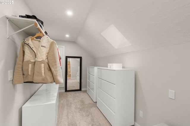 9990 SW Morrison St, Portland, OR 97225 - walk in closet featuring vaulted ceiling, a skylight, and light colored carpet