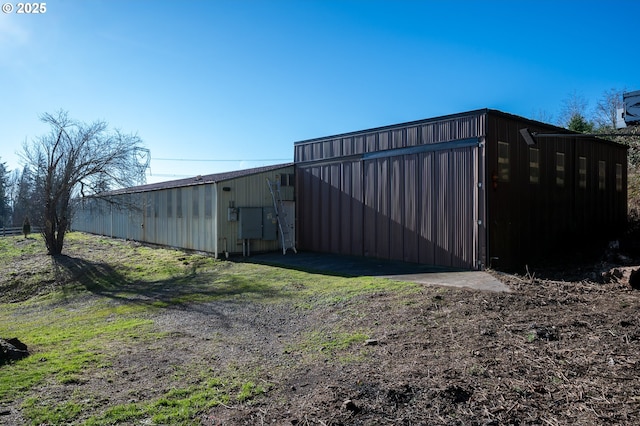 exterior space with an outbuilding and an outdoor structure