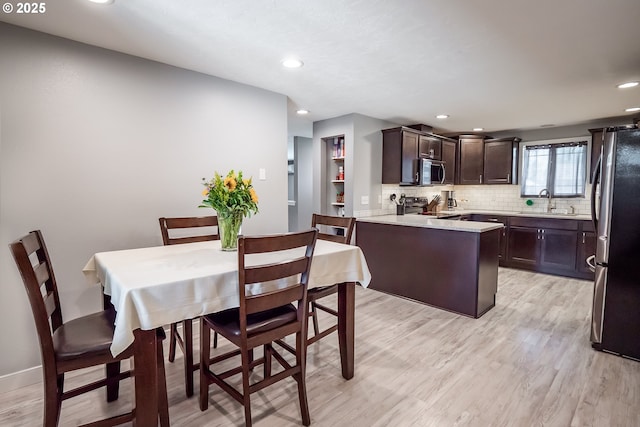4260 Murnane St, Eugene, OR 97402 - dining room with light wood-type flooring, baseboards, and recessed lighting