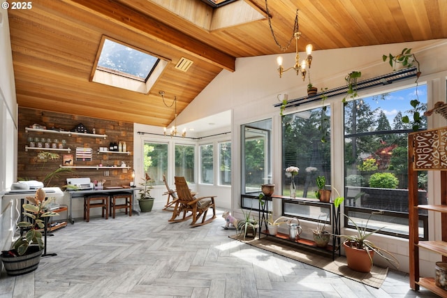 sunroom with an inviting chandelier, beam ceiling, visible vents, and a skylight