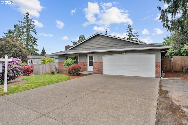 702 Brighton Ave, Oregon City, OR 97045 - view of front facade with brick siding, driveway, an attached garage, a chimney, and roof with shingles