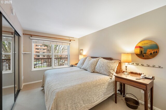 carpeted bedroom featuring a closet