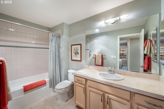 full bathroom with tile patterned flooring, shower / bath combo, vanity, and toilet