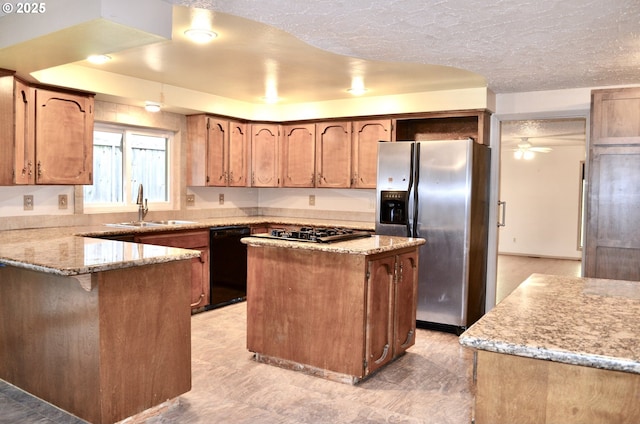 kitchen with stainless steel refrigerator with ice dispenser, a sink, gas cooktop, black dishwasher, and a peninsula