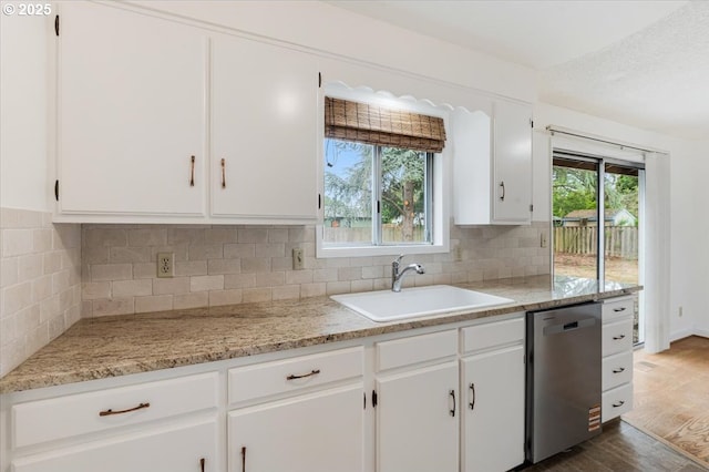 10700 NE 46th St, Vancouver, WA 98682 - kitchen featuring dishwasher, a sink, white cabinetry, dark wood finished floors, and backsplash